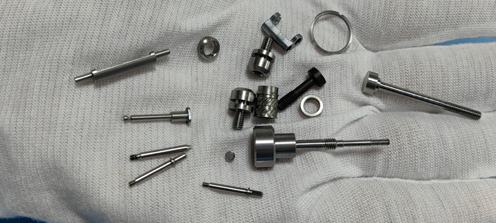 Swiss machining of small titanium components for high precision applications Small titanium precision parts manufactured by Swiss machining process